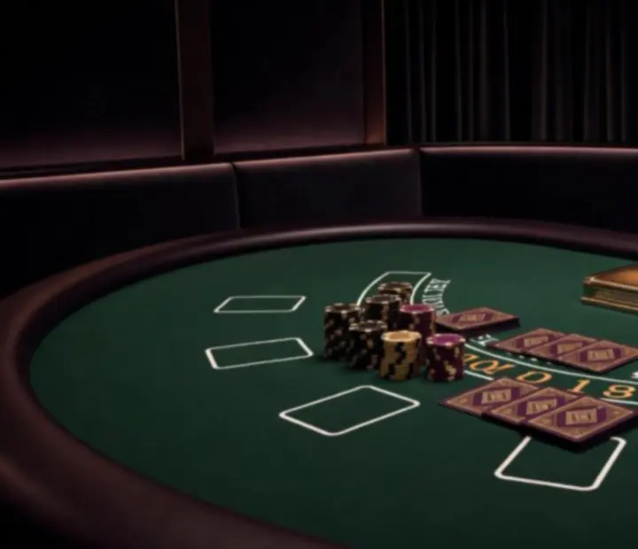 Nasvícený blackjack stůl během nočního eventu